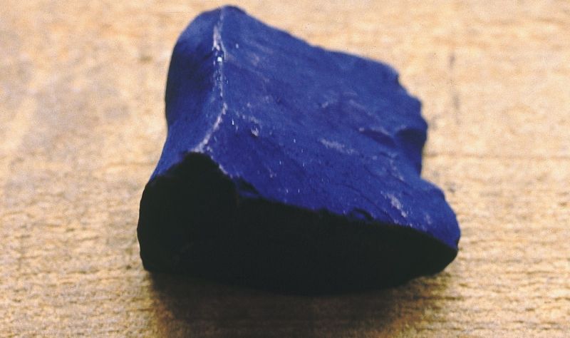 The hard-pressed fragment of a once larger indigo cube would have been ground to a fine powder before dyeing blue. An imported dye most sought after before synthetic dyeing, which also must have been used by Whitby dyers as one of few possible dyes for hardy blue colours (Private ownership). Photo: The IK Foundation.