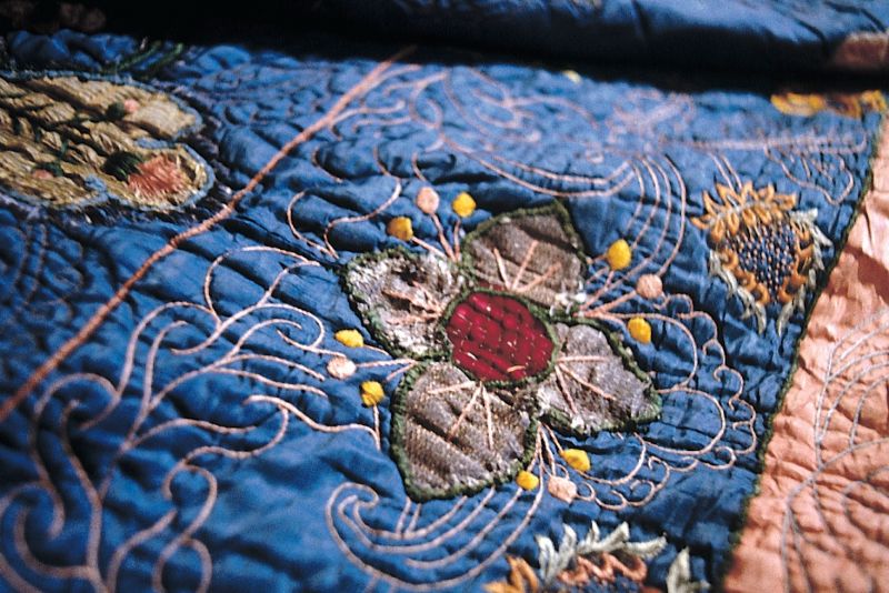 This quilted silk bedcover – with rich silk embroidery – is a typical example of textile furnishing that could have been used in wealthy homes of the city during the second half of the 18th century. However, as with many similar fine silk fabrics/items kept by the local museum, it is not known where it was used or even less so by whom it was stitched. (Collection: Malmö Museum, MM 52381, part of). Photo: The IK Foundation, London.