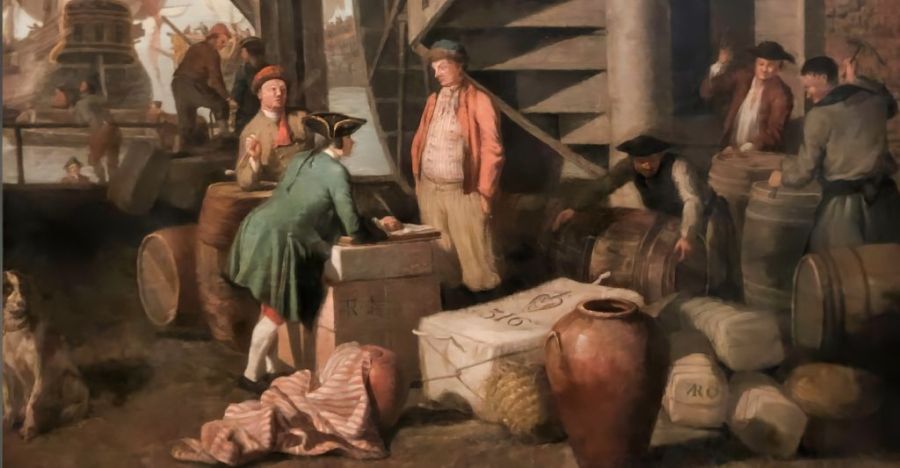 This close-up detail of a large-scale painting illustrates ‘A Thames-side Quay’ around the year 1757; it is uncertain if the Whitby coasters are anchored in this particular quayside area, but this is, even so, an interesting comparison that it visibly reflects the trading of various goods. Wares were kept in bales, barrels, pots, and boxes – striped red and white cotton or silk fabric was included, and East India goods were judging by the United East India Company mark on one of the bails. Oil on canvas by Samuel Scott (c. 1702-1772). (Collection: Victoria and Albert Museum, London, no. FA249). Photo: Viveka Hansen, The IK Foundation.