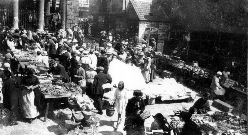  Whilst a somewhat later photograph – circa 1920 – shows bedlinen and table-linen for sale, prominently displayed to the prospective buyer on a table together with folded textiles. This snapshot of everyday life on a summer day suggests that textiles are also likely to have been regularly displayed for sale in this way in the market square on Saturdays even before 1914 in Whitby. (Courtesy of: Whitby Museum, Photographic Collection, E 5450. Unknown photographer).